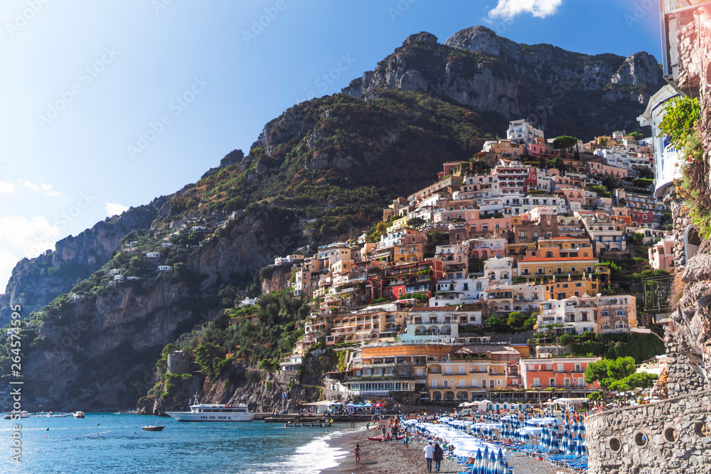 Villas in Positano close up, town at Tyrrhenian sea, Amalfi coast, Italy, hotel and hostel concept, sea with ships and boats, travel vacation concept