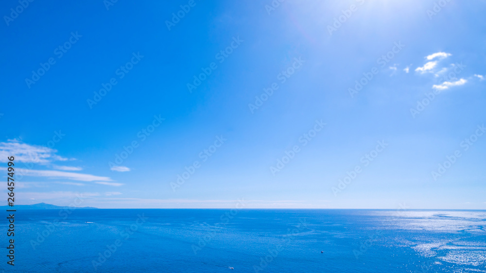 view of the horizon, the sea, the ocean. rocks and mountains, boats and ships, recreation and holidays in Europe, Italy. place for text. fishing. transport, transportation of tourists, tours and trips