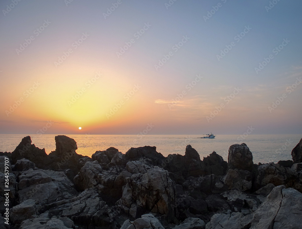 sunset over the sea in sicilian sity Cefalu
