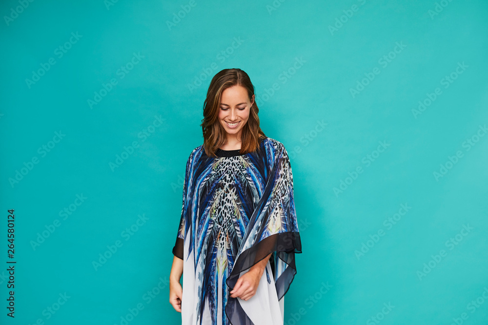 Gorgeous woman in blue kaftan, looking down Gorgeous woman in blue kaftan, looking down