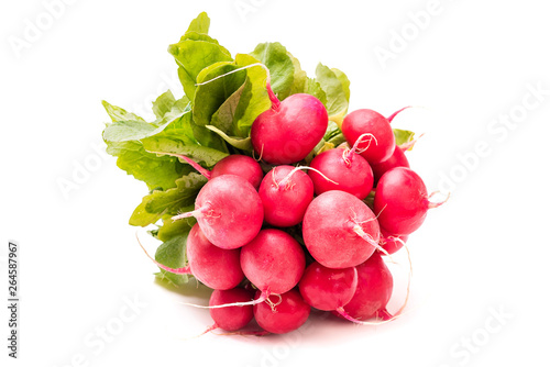 bunch of radishes with green leaves