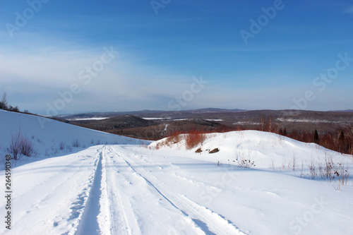 winter landscape with road and snow