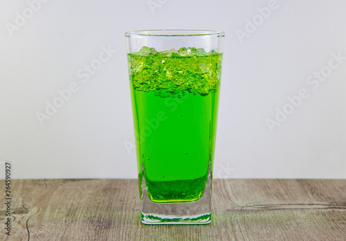 A glass of nutritious estragon drink to maintain a healthy lifestyle. Were added to the drink ice.