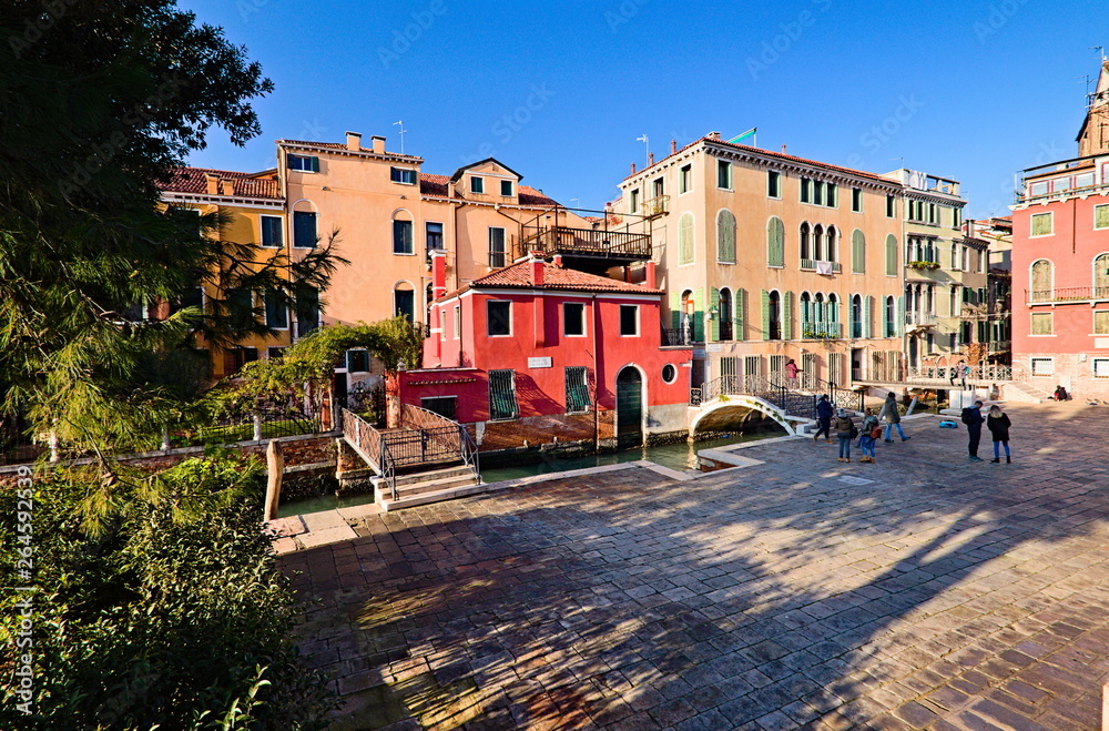 Venice, Italy - December 29, 2018: Campiello San Vidal is a typical square in Venice old town with bridges and water canals