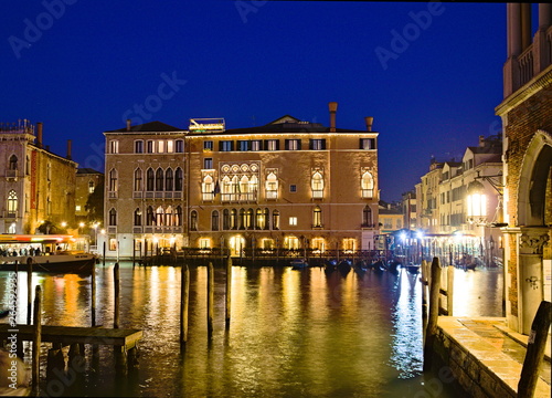 Venice, Italy - December 29, 2018: Night view of the Ca' Sagredo Hotel overlooking the Grand Canal photo