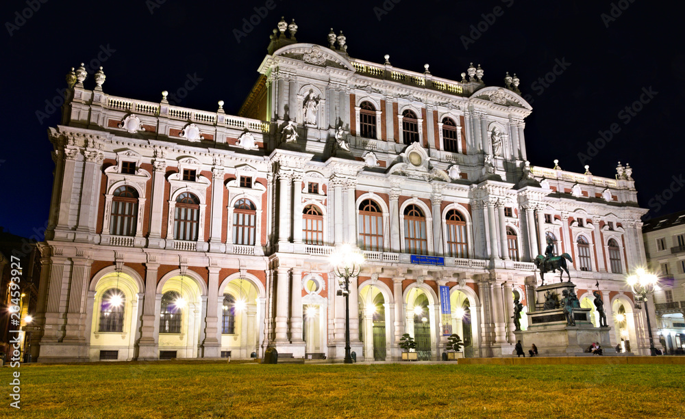 Turin, Italy - March 25, 2019: Palazzo Carignano, historical building from the XVII century in the centre of Turin, Italy, which houses the Museum of the Risorgimento. Night view, wide angle shot