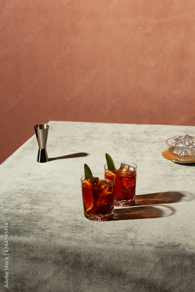 Φωτογραφία Negroni, an Iba cocktail, with 1/3 gin, 1/3 bitter, 1/3 vermut, in luxury pop style, rich and colorful
