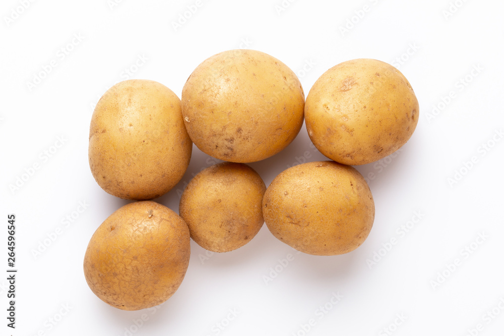 Potatoes isolated on white background. Flat lay. Top view. Potatoes isolated on white background. Flat lay. Top view.
