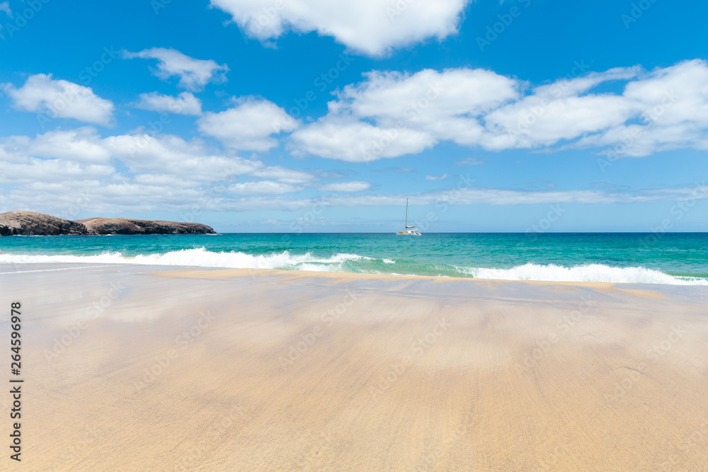 Panorama of beautiful beach and tropical sea of Lanzarote. Canaries