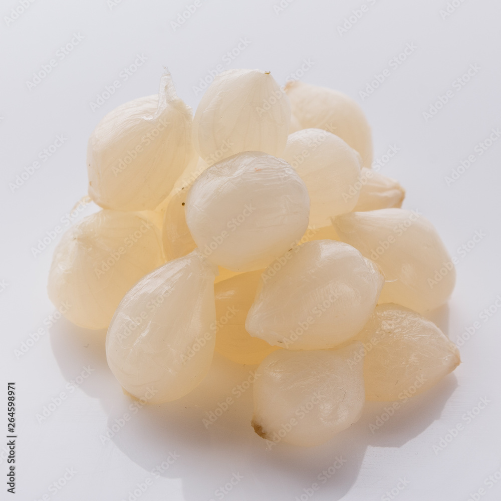 pickled vegetables on a white acrylic background pickled vegetables on a white acrylic background