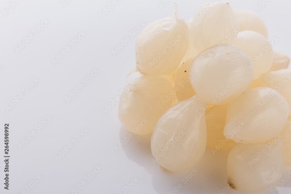 pickled vegetables on a white acrylic background pickled vegetables on a white acrylic background