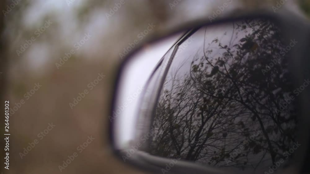 car mirror reflexion of sky and cloud