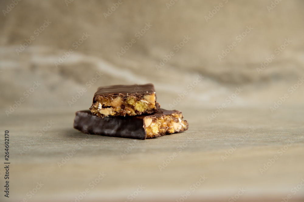 Muesli and cereal bar on marble stone background Muesli and cereal bar on marble stone background