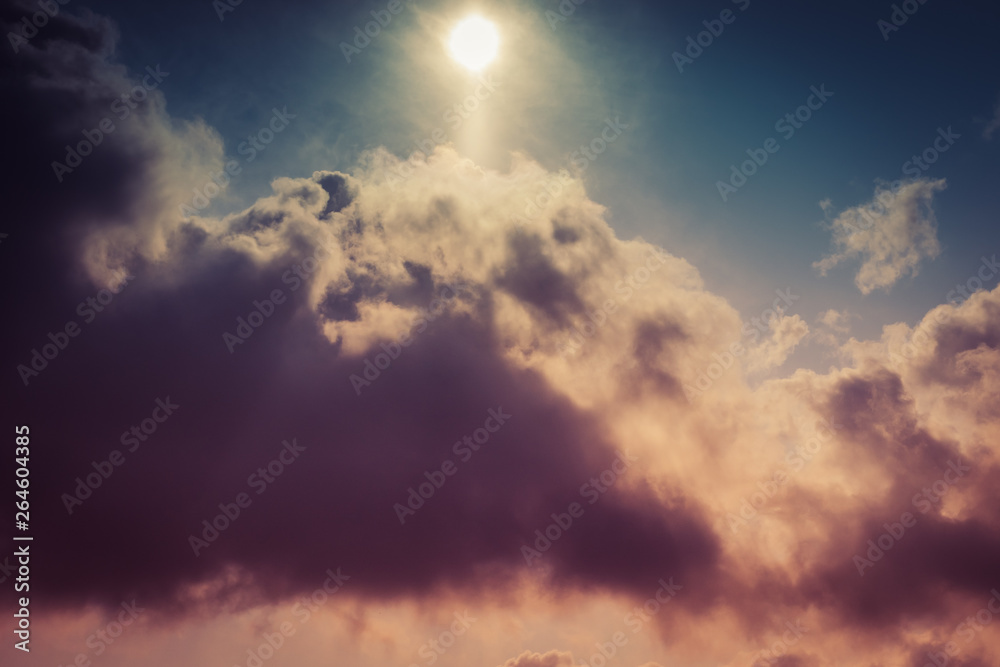 Dramatic sky with stormy clouds at sunset. Clouds and sky background.