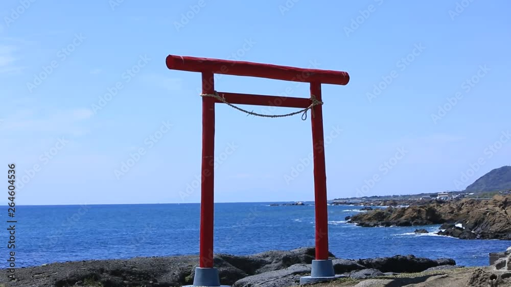 Japanese landscape. Red Torii at the seaside Japanese landscape. Red Torii at the seaside