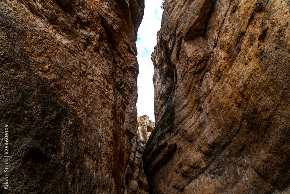 Fantastic view of a sky between high sculptural rocks.