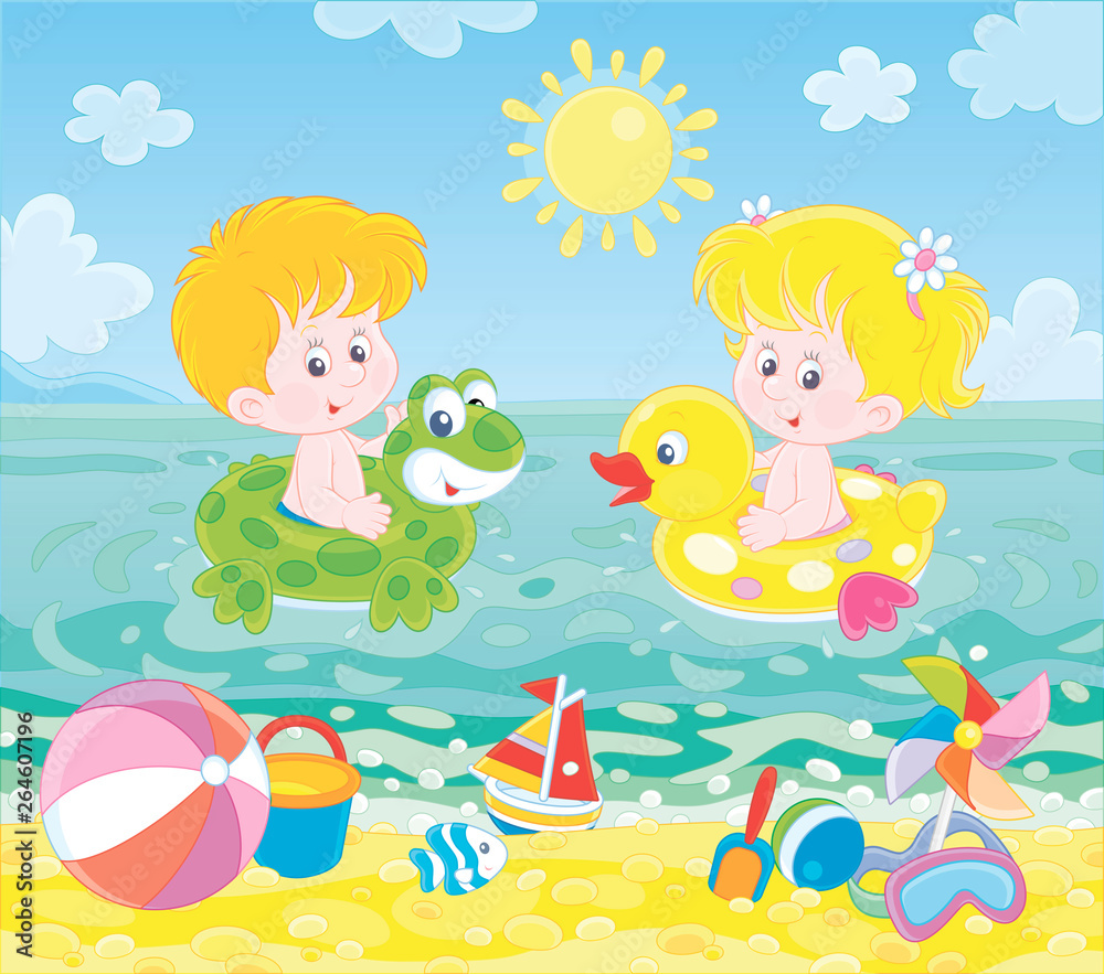 Happy little kids swimming in inflatable rings in blue water on a sea beach on a sunny summer day, vector illustration in a cartoon style