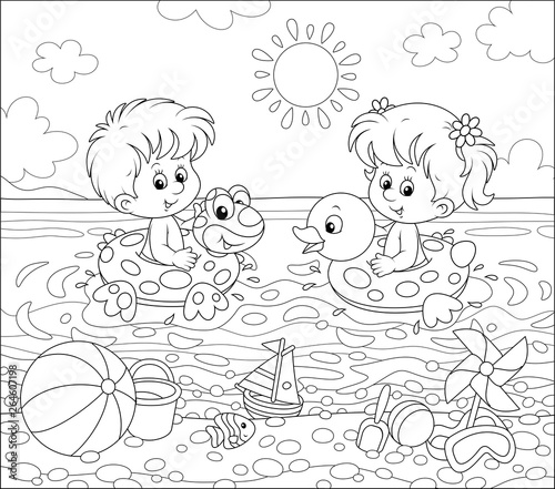 Happy little kids swimming in inflatable rings on a sea beach on a sunny summer day, black and white vector illustration in a cartoon style for a coloring book