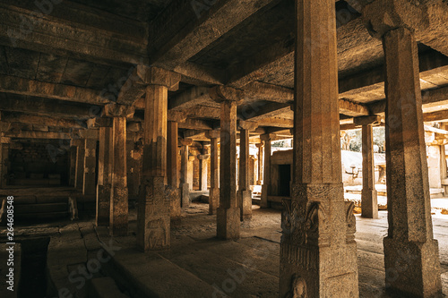 Standing old columns in a ancient temple in Hampi  © Wally