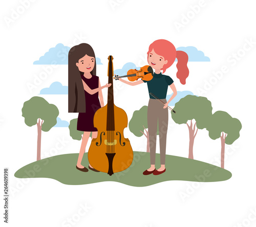 women with musical instruments in landscape