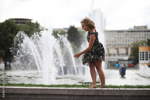 Beautiful girl in the summer park