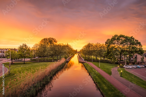 Spectacular sunset over the Ringvaart (ring canal) in the Rotterdam suburb of Nieuwerkerk aan den Ijssel photo