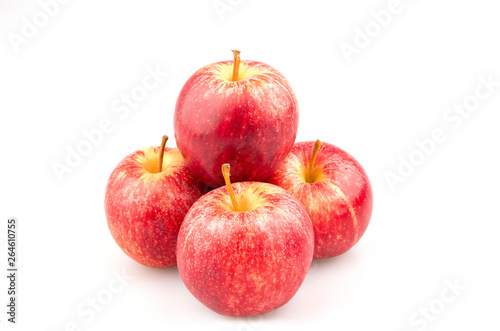 Ripe red apples on white background