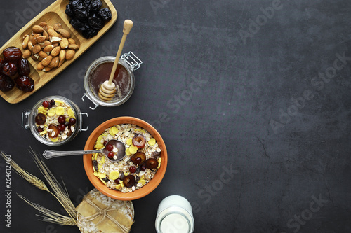 Healthy breakfast. Muesli from cereals with milk berries.