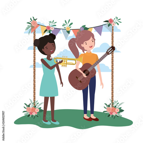 women with musical instruments in landscape