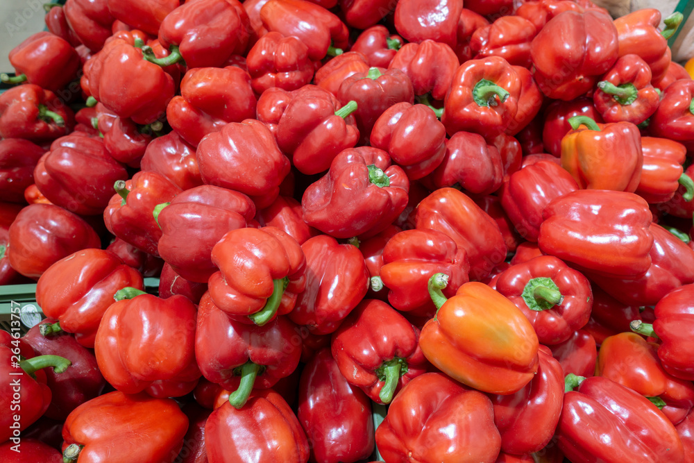 Fresh red pepper harvest close up on the market. Fresh red pepper harvest close up on the market.