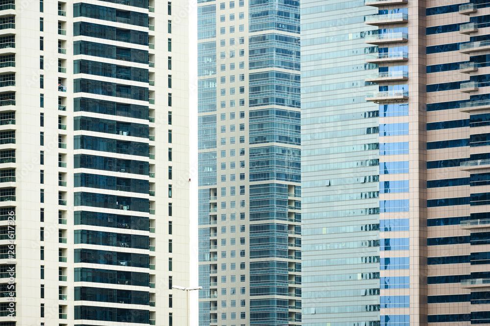 Close-up view of some modern skyscrapers and towers. Dubai Marina, Dubai, United Arab Emirates, UEA. Close-up view of some modern skyscrapers and towers. Dubai Marina, Dubai, United Arab Emirates, UEA.