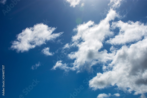 Fototapeta Naklejka Na Ścianę i Meble -  Blue sky with white clouds high contrast, cumulus