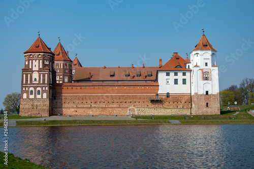 Mir, Belarus, April 24, 2019: Mir castle, a monument of architecture, a brick fortress on the banks of the lake