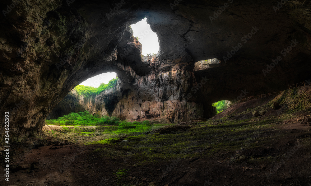 Obraz premium Devetashka cave, near Lovech city, Bulgaria. In this cave have been made some scenes of The Expendables 2