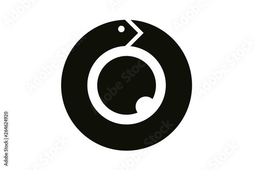 The magic symbol of Ouroboros. Snake in the form of a ring biting its tail and all-seeing eye in the center photo