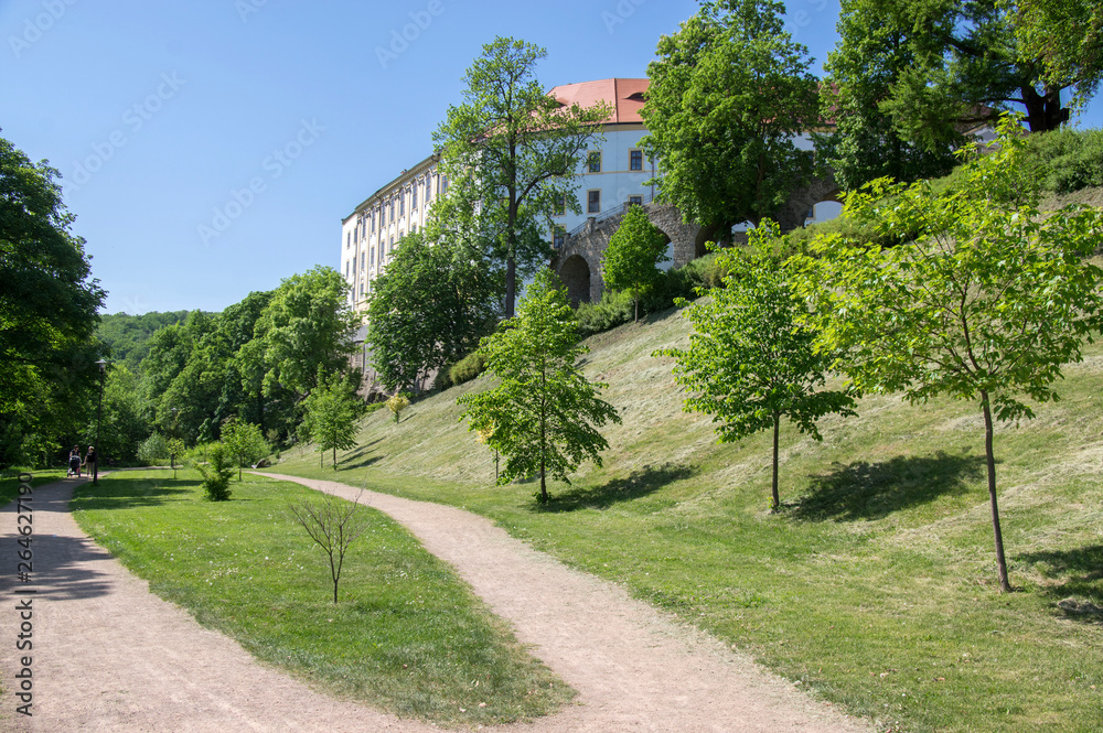 Beautiful historic old castle in Czech town called Decin. Great summer day with sunlight and blue sky.