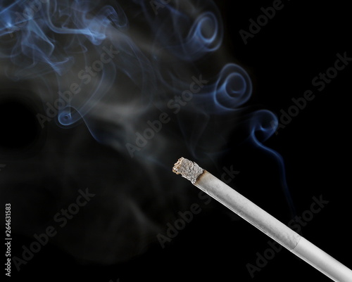 White smoke with cigarette isolated on black background