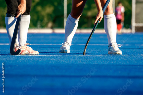 Hockey being played on a modern astro turf field