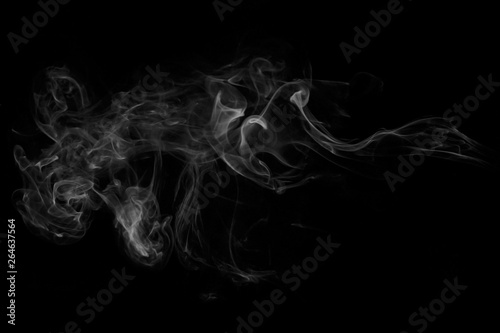 white smoke on a black background