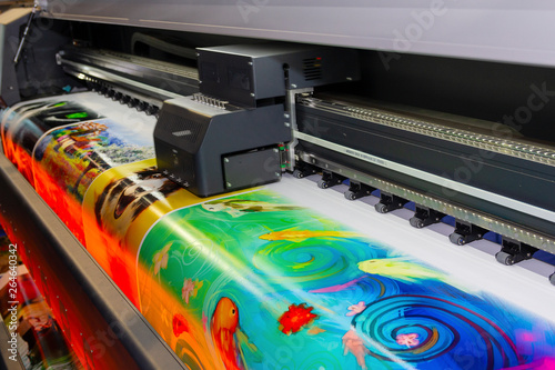 Large format printing machine in operation. Industry photo