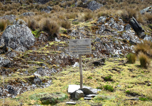 Sign for start of the trail for Royal Cinclodes habitat at top of the Abra Malaga pass in the high Andes of Peru. Part of the Cordillera Vilcanota mountain range.