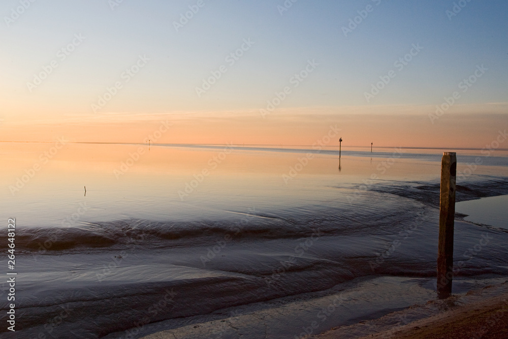 Sunset over the Wadden Sea near Holwerd, Netherlands