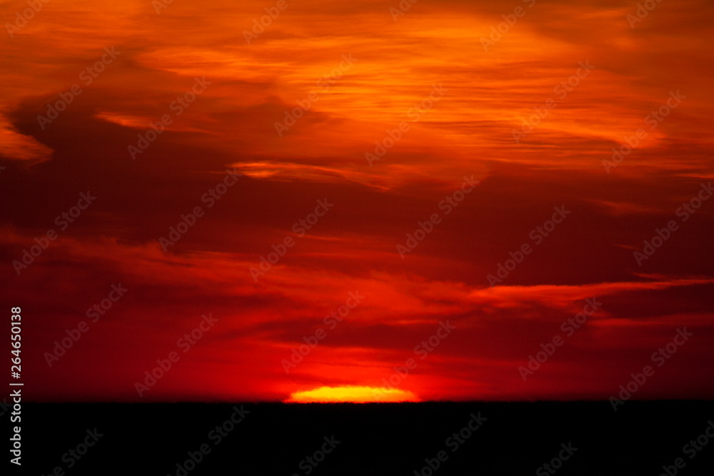 Stunning sunset seen from the beach in Katwijk, Netherlands.