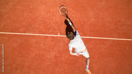 Top view of tennis player in action © luckybusiness