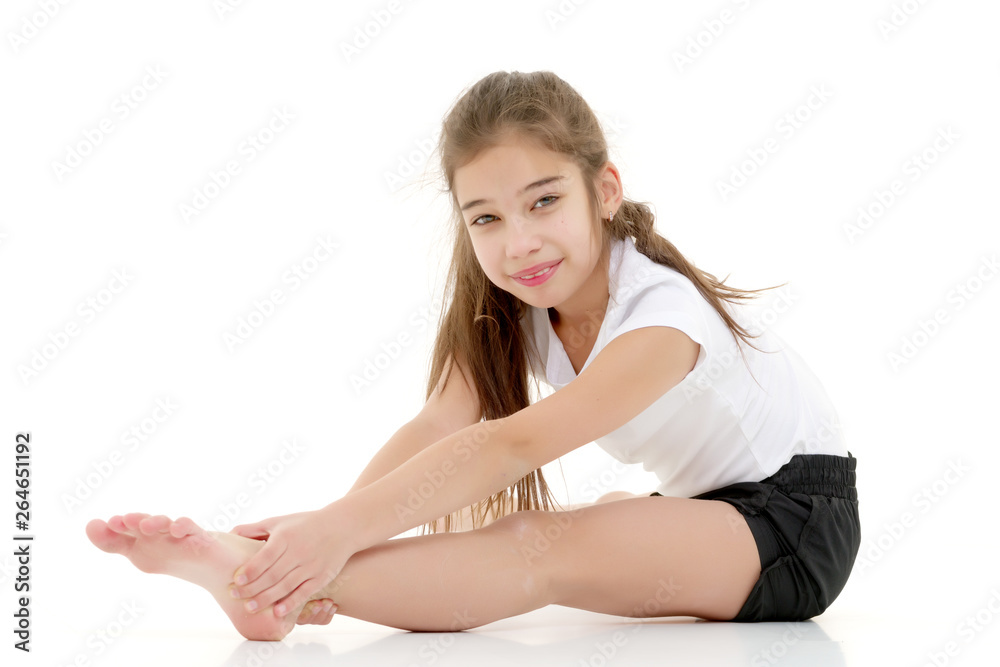 The gymnast prepares to perform the exercise. The gymnast prepares to perform the exercise.