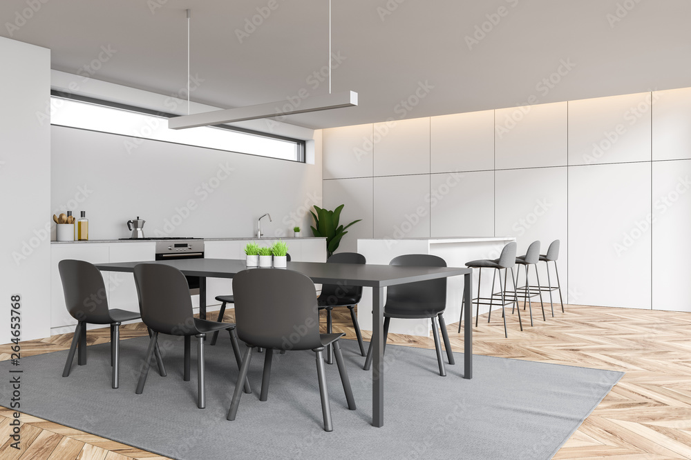 White kitchen corner with table and bar