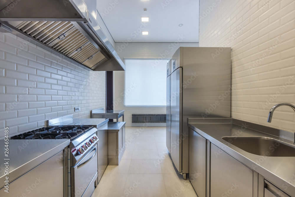 Interior of professional kitchen. Appliances for food preparation. Refrigerators Interior of professional kitchen. Appliances for food preparation. Refrigerators