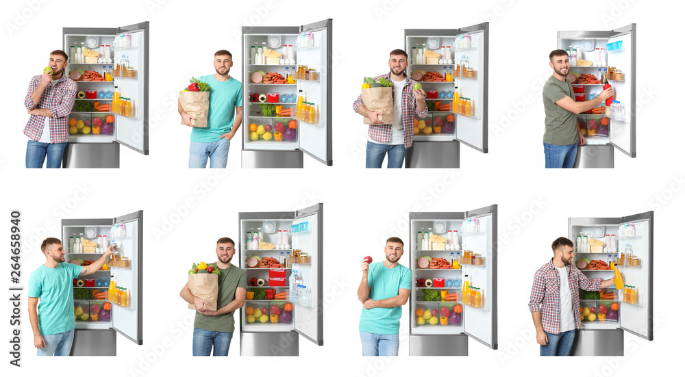 Young man near open refrigerator on white background