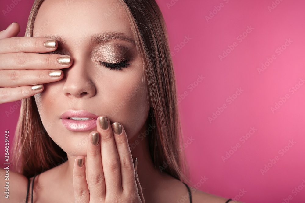 Beautiful woman with stylish nail polish on color background, space for text Beautiful woman with stylish nail polish on color background, space for text