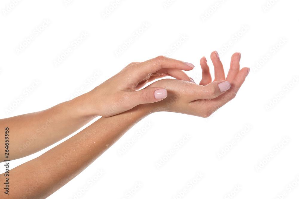 Woman with wet hands on white background, closeup. Spa treatment Woman with wet hands on white background, closeup. Spa treatment
